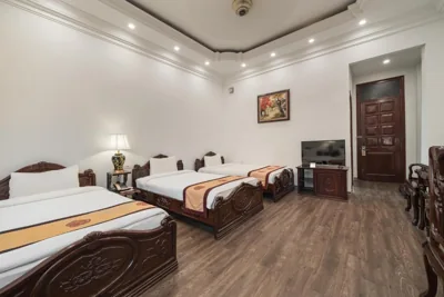 Deluxe-driepersoonskamer — Hanoi Little Town Hotel
